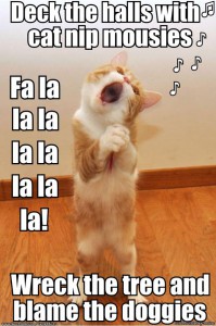 meme of a cat singing Christmas carols